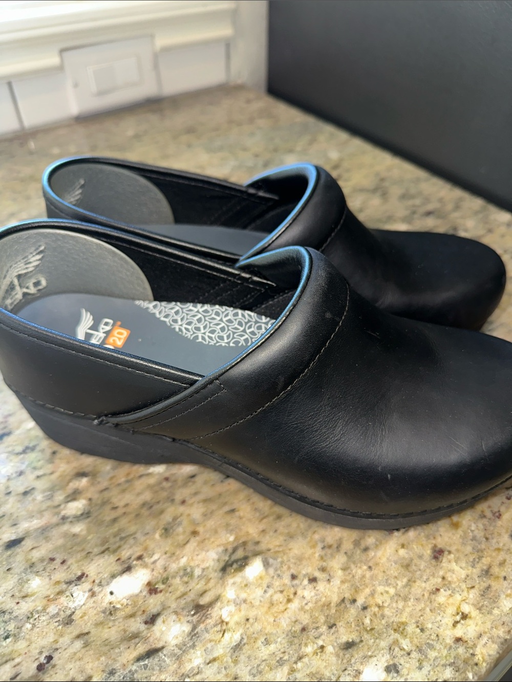 Dansko Black Leather Slip-On Clogs